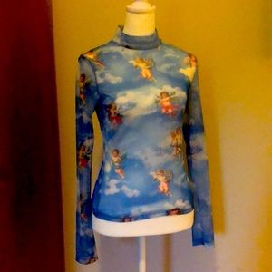 Shear cherub mock turtleneck top